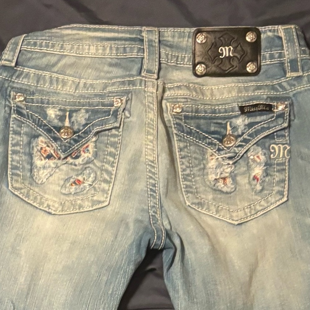 Distressed Blue Jeans